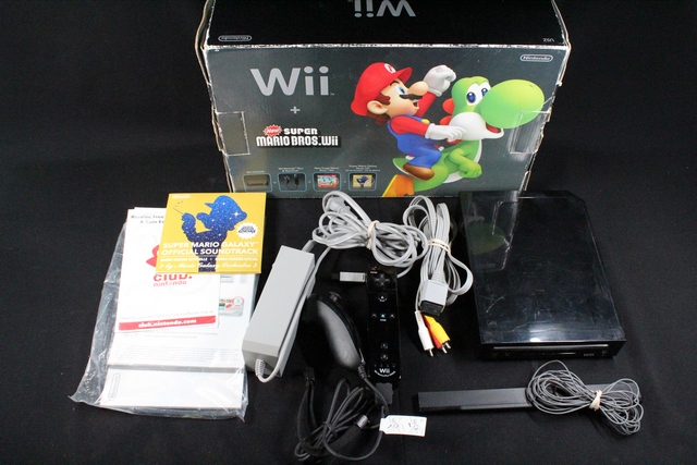 Console Wii + acc + boite (as pas jeu Mario)